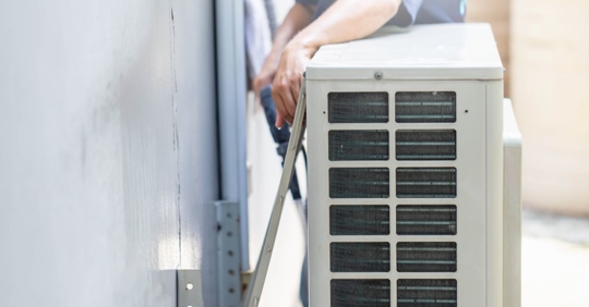 man troubleshooting HVAC